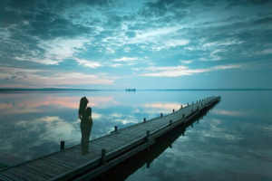 A person standing by the sea dreaming